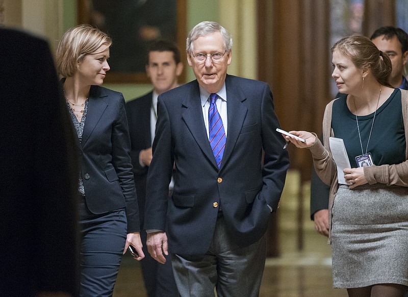 Senate Majority Leader Mitch McConnell, R-Ky., leaves the chamber at the end of legislative business Monday, Dec. 14, 2015, as lawmakers rush to wrap up their work and pass a funding bill to avert a government shutdown, at the Capitol in Washington. 