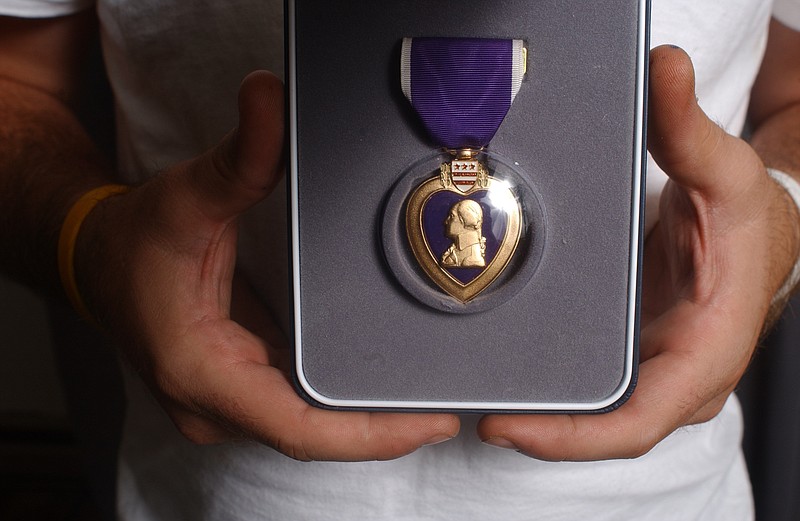 A Purple Heart, like those that will be presented to victims of the July 16 shootings, is pictured.