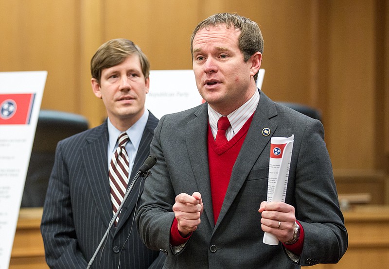
              FILE - In this Feb. 2, 2015, file photo, state Rep. Jeremy Durham, R-Franklin, speaks at a news conference at the legislative office complex in Nashville, Tenn., while Sen. Brian Kelsey, R-Germantown, left, looks on. Voters in the home county of Durham, a top Republican in the state house, are receiving robocalls demanding his resignation. (AP Photo/Erik Schelzig, File)
            