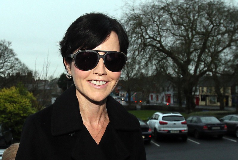 
              Cranberries singer Dolores O'Riordan arrives at Ennis District Court in Ennis, Ireland, Wednesday, Dec. 16, 2015. The lead singer of the Irish rock band The Cranberries, Dolores O’Riordan, has pleaded guilty to assaulting three policemen and a flight attendant during an alleged psychotic episode last year. Her lawyer said she accepted evidence of the assault and obstruction charges facing her. Judge Patrick Durcan ordered the singer to write letters of apology to those she attacked and that he would sentence her early next year. She faces possible penalties ranging from a cash fine to six months’ imprisonment. (Niall Carson/PA via AP)     UNITED KINGDOM OUT      -     NO SALES      -      NO ARCHIVES
            