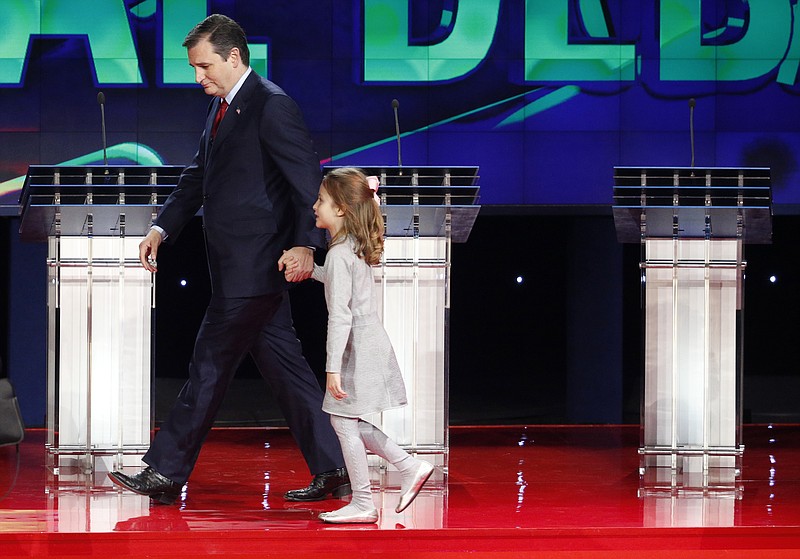 
              Ted Cruz walks with daughter Caroline following the CNN Republican presidential debate at the Venetian Hotel & Casino on Tuesday, Dec. 15, 2015, in Las Vegas. (AP Photo/John Locher)
            