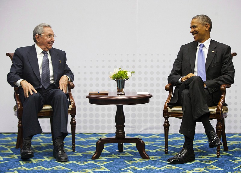 
              FILE - In this April 11, 2015, file photo, Cuban President Raul Castro, left, and U.S. President Barack Obama meet at the Summit of the Americas in Panama City, Panama, Saturday. The United States and Cuba publicly say they’re delighted with the state of diplomatic relations a year after Presidents Barack Obama and Raul Castro declared the end to more than 50 years of official hostility. The two countries have reopened embassies in Havana and Washington; agreed to a pilot program restarting direct mail service; signed two deals on environmental protection; and launched talks on issues from human rights to compensation for U.S. properties confiscated by Cuba’s revolution. (AP Photo/Pablo Martinez Monsivais, File)
            