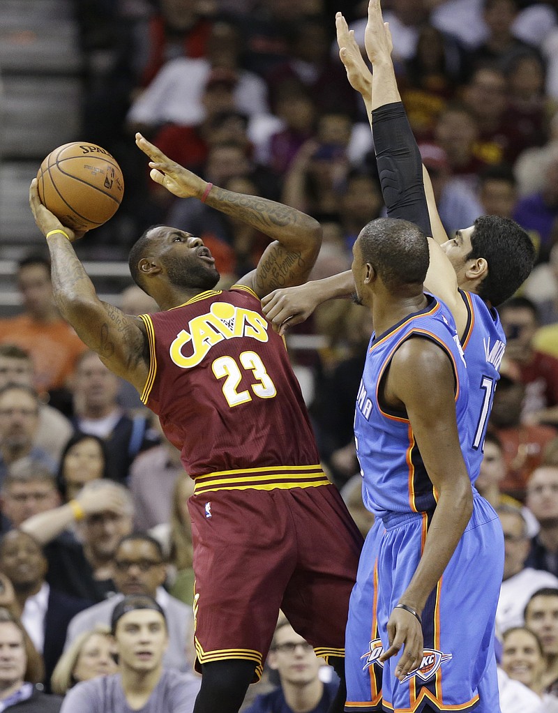 The Thunder take on the Cavaliers in the an NBA basketball game in Oklahoma  City.