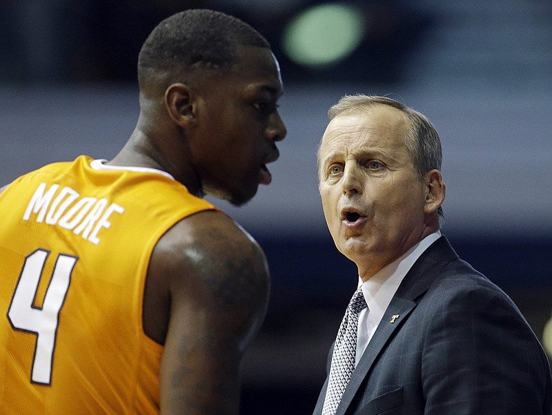 Tennessee head coach Rick Barnes talks with Armani Moore during the first half of an NCAA college basketball game against Butler, Saturday, Dec. 12, 2015, in Indianapolis. (AP Photo/Darron Cummings)