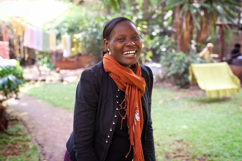 Gladys buys a 10-cent bus ticket to ride through the crazy, overwhelming traffic of Nairobi, Kenya, facing the constant threat of car bombs to get to her job at Amani, a nonprofit that helps African women earn income from art, home goods and clothing they make.