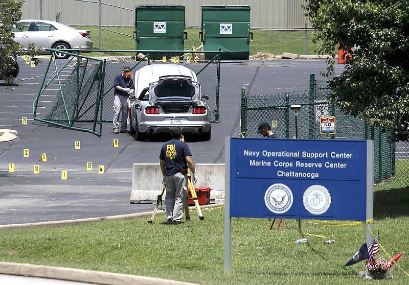 FBI investigators work the scene of the July, 16 shooting at the Naval Operational Support Center on Amnicola Highway on Saturday, July 18, 2015, in Chattanooga, Tenn. 