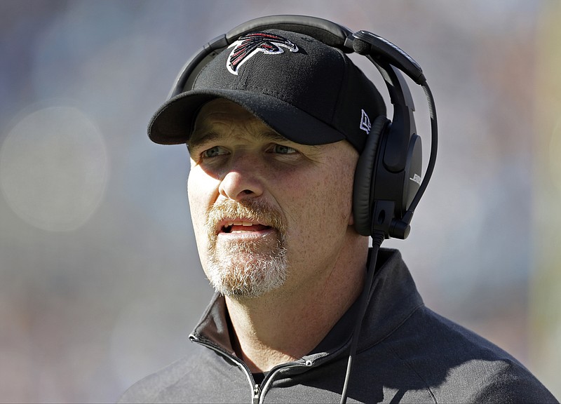 FILE - In this Dec. 13, 2015, file photo, Atlanta Falcons head coach Dan Quinn directs his team against the Carolina Panthers in the first half of an NFL football game in Charlotte, N.C.  After the Falcons won for the first time in seven weeks, first-year coach Quinn knows it is likely too late to save their playoff chances, but at least the victory gives the team hope for a winning record. (AP Photo/Bob Leverone, File)