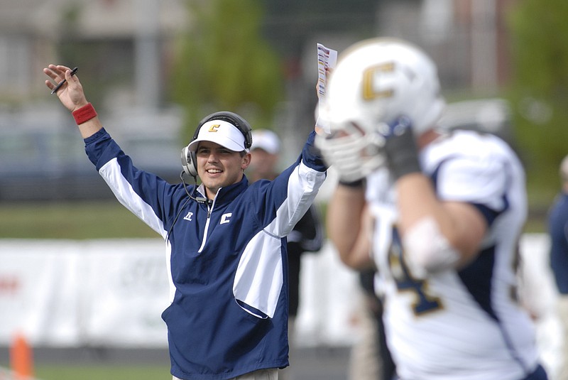 Former UTC coach Will Healy celebrates a Mocs touchdown at Austin Peay in the inaugural game at Governors Stadium in September 2014.