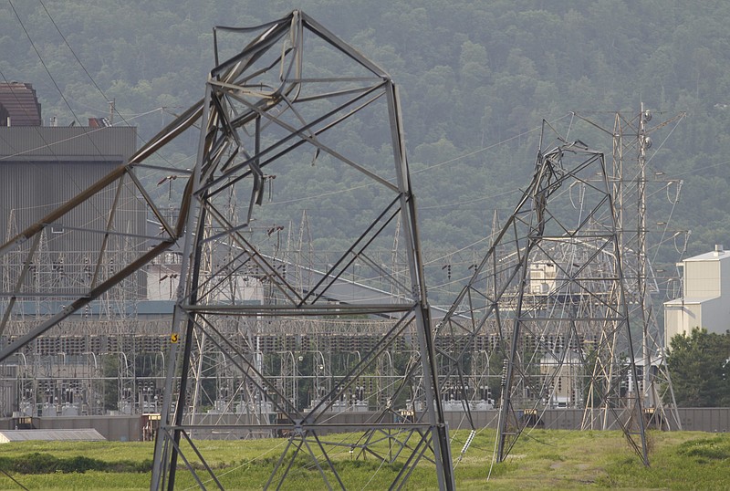 Damaged transmission lines running from TVA's Widows Creek Fossil Fuel Plant block Jackson County Highway 96 in Brudgeport, Alabama.