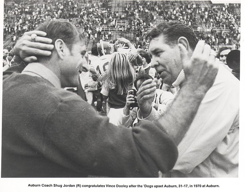 Georgia's Vince Dooley, left, and Auburn's Ralph "Shug" Jordan are the last football coaches at their respective schools to step down on their own terms.