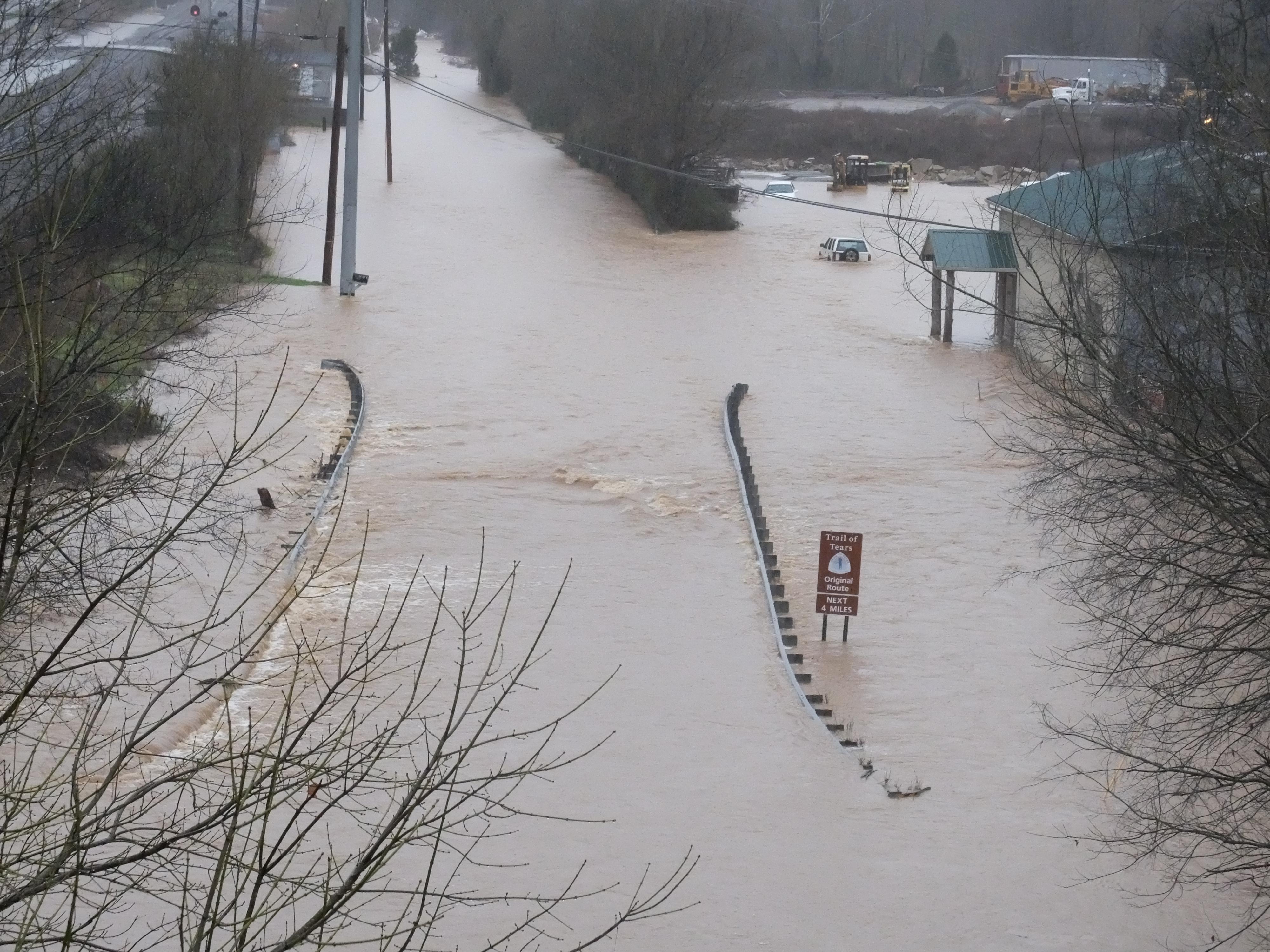 This section of Daisy Dallas Road, just south of Sequoyah Access Road, is completely under water Friday morning as flash floods hit in the Tennessee Valley.
