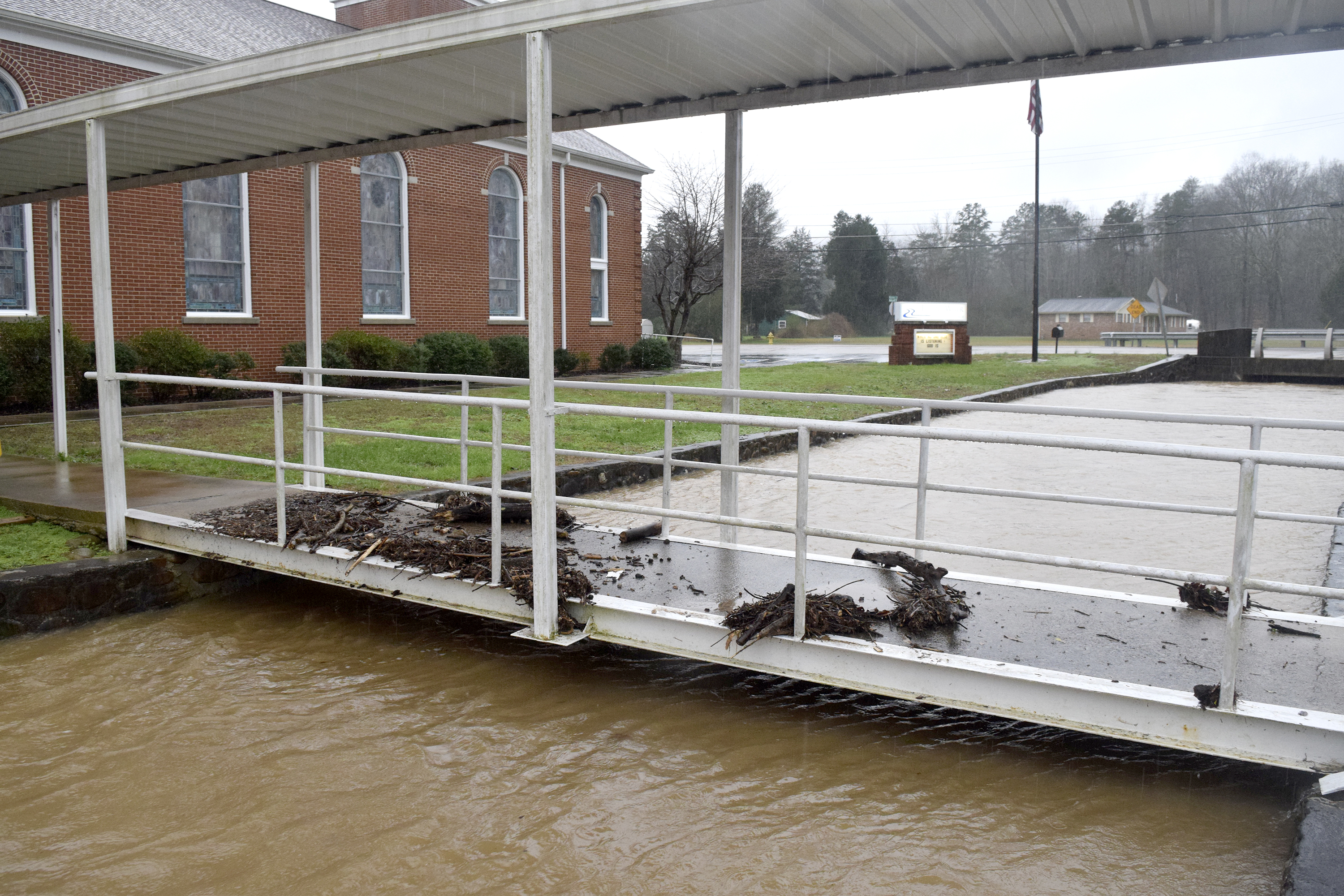 Debris marks the high-water mark on a bridge over Roberts Mill Branch at the Falling Water Baptist Church. Heavy rains caused flooding and road closures across Hamilton County on Christmas Day.