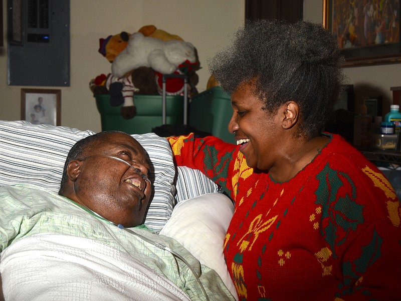 Cindy Thomas talks to her husband, Eddie J. Thomas, Sr., Tuesday, December 22, 2015 in their Hixson home.