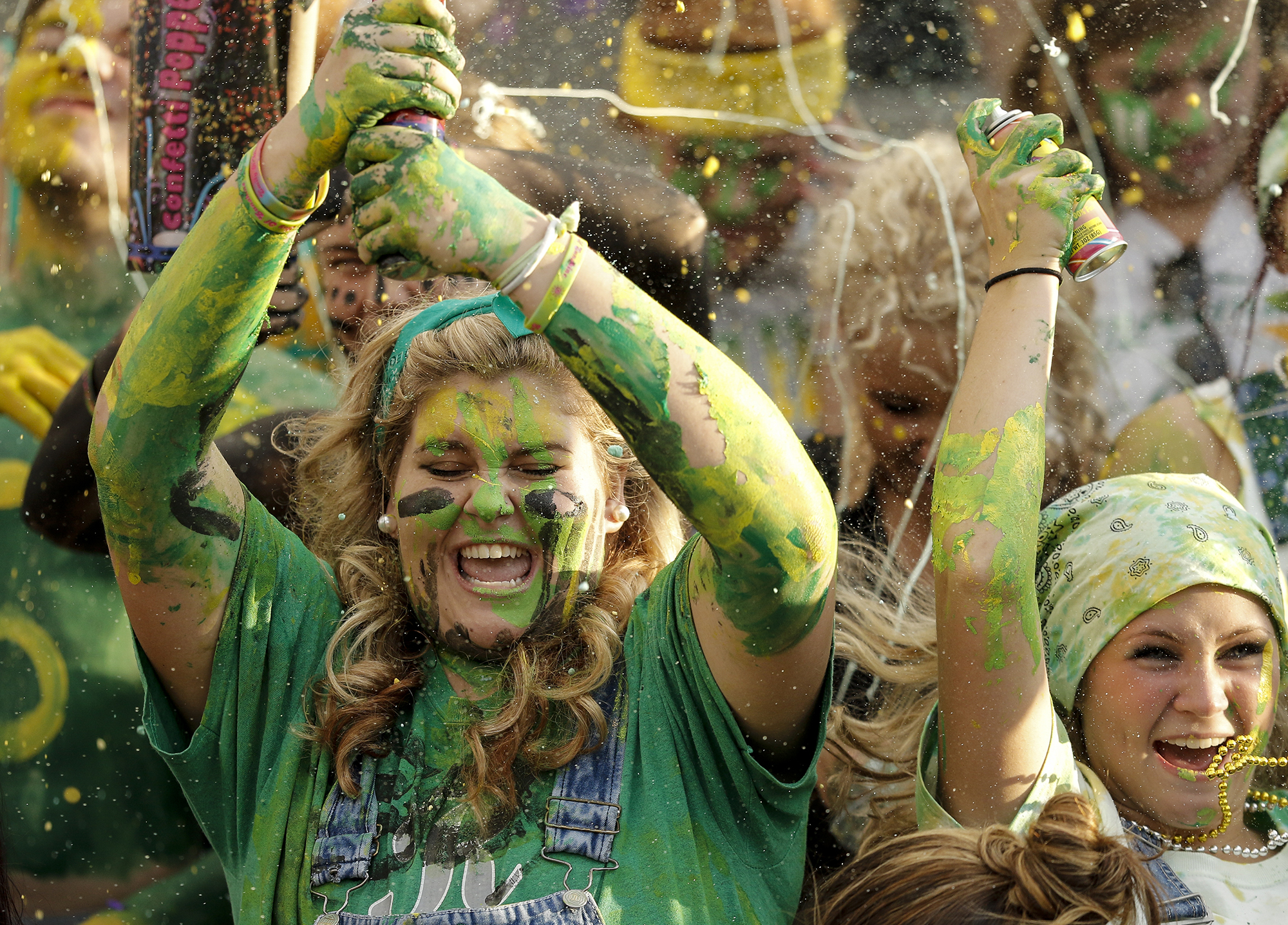 Rhea County students launch confetti at the start of their prep football game against Baylor at Rhea County High School on Aug. 20, 2015, in Evensville, Tenn.