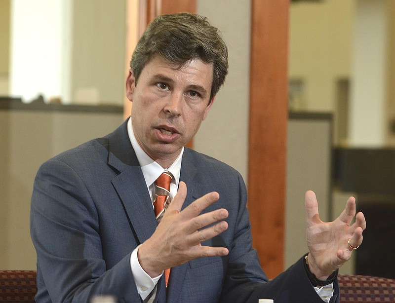 Chattanooga Mayor Andy Berke speaks to members of the Chattanooga Times Free Press editorial board, May 20, 2015, in Chattanooga, Tenn.