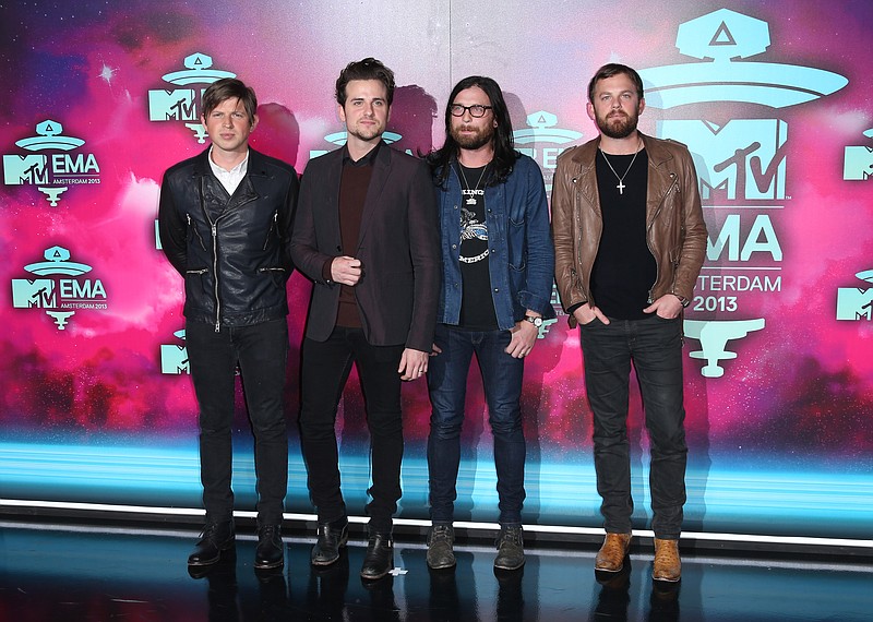 
              FILE - In this Nov. 10, 2013 file photo, from left, Matthew Followill, Jared Followill, Nathan Followill and Caleb Followill of the band Kings of Leon pose for photographers upon arrival at the 2013 MTV Europe Music Awards, in Amsterdam, Netherlands. The Kings of Leon took it easy this year after finishing up their international tour for their 2013 album “Mechanical Bull,” but the Grammy-winning family rock group is ready to start 2016 with a bang, literally. They are headlining the New Year’s Eve celebrations in downtown Nashville, Tenn., where they’ve made their home for 15 years. (Photo by Joel Ryan/Invision/AP, File)
            