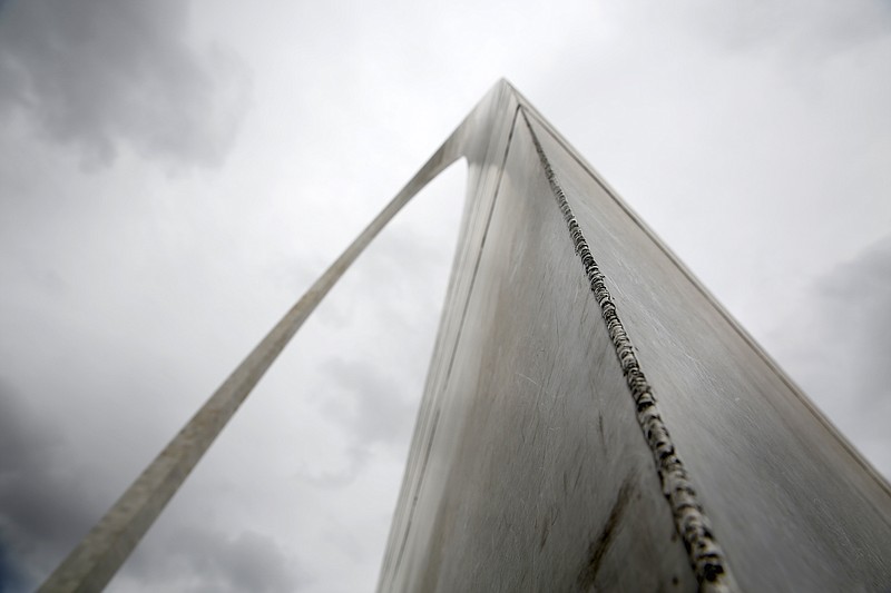 
              FILE - In this Oct. 23, 2015 file photo, welds are seen going up the south leg of the stainless steel Gateway Arch in St. Louis. Under President Dwight D. Eisehower, the nation prepared for the 50th birthday of the National Park Service with a spending splurge that refurbished Independence Hall in Philadelphia and helped complete the Gateway Arch in St. Louis and the 469-mile Blue Ridge Parkway. Next year, the world-famous system turns 100 and the celebration will be far more modest. (AP Photo/Jeff Roberson, File)
            