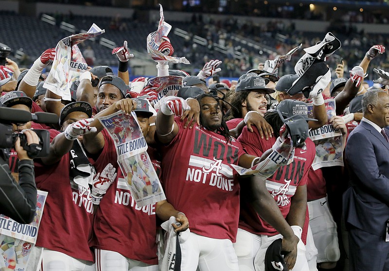 Alabama celebrates after the Cotton Bowl NCAA college football semifinal playoff game against Michigan State, Thursday, Dec. 31, 2015, in Arlington, Texas. Alabama won 38-0 to advance to the championship game. (AP Photo/Tony Gutierrez)