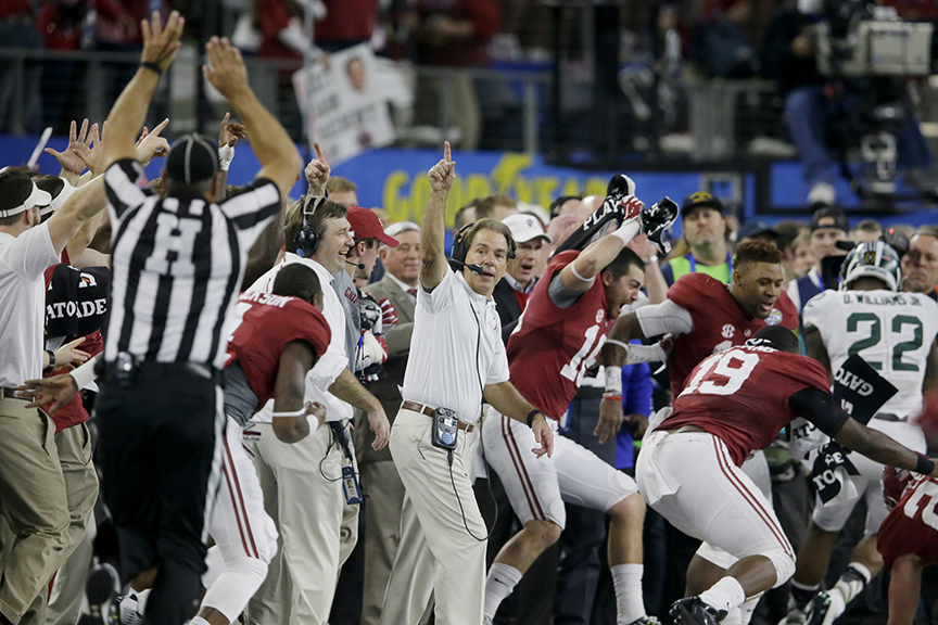 Alabama head coach Nick Saban and team take the field at the end of the Cotton Bowl NCAA college football semifinal playoff game against Michigan State, Thursday, Dec. 31, 2015, in Arlington, Texas. Alabama won 38-0 to advance to the championship game. (AP Photo/LM Otero)
