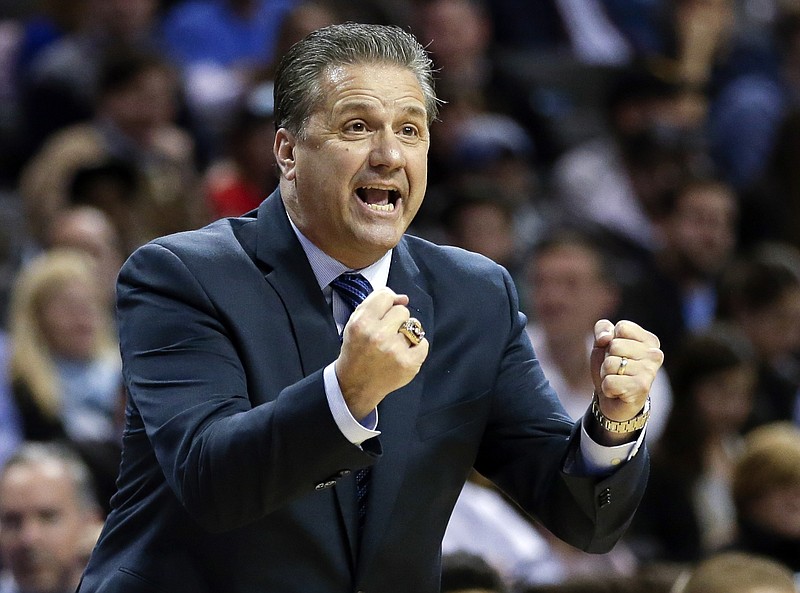 FILE - In this Dec. 19, 2015, file photo, Kentucky head coach John Calipari calls out to his team during the first half of an NCAA college basketball game against Ohio State in New York. As the Southeastern Conference heads  into league competition, it remains tough to figure which teams stand as defending champion Kentuckys biggest competition. (AP Photo/Frank Franklin II, File)