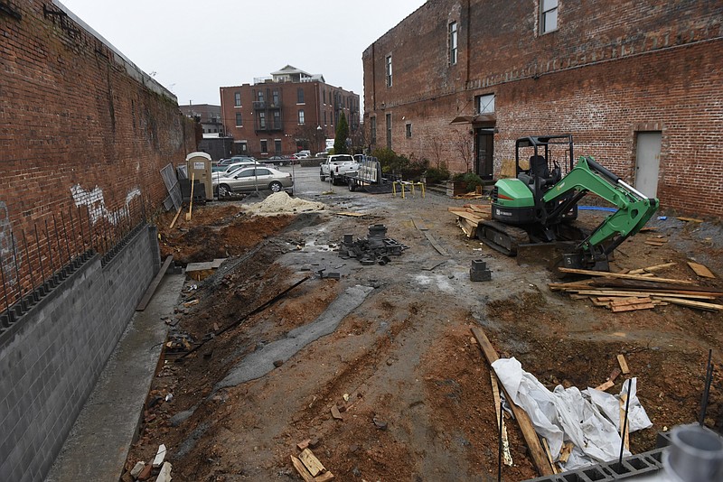 Photographed on Tuesday, Dec. 22, 2015, in Chattanooga, Tenn., City Homes on Market is under construction directly across Market Street from the Chattanooga Choo Choo. 