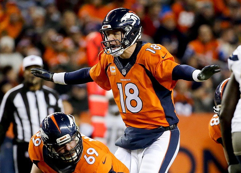 Denver Broncos quarterback Peyton Manning yells to his team during the second half in an NFL football game against the San Diego Chargers, Sunday, Jan. 3, 2016, in Denver. (AP Photo/Jack Dempsey)