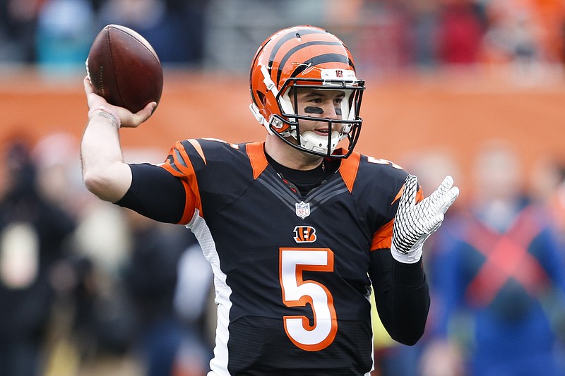 
              Cincinnati Bengals quarterback AJ McCarron prepares to in the first half of an NFL football game against the Baltimore Ravens, Sunday, Jan. 3, 2016, in Cincinnati. (AP Photo/Gary Landers)
            