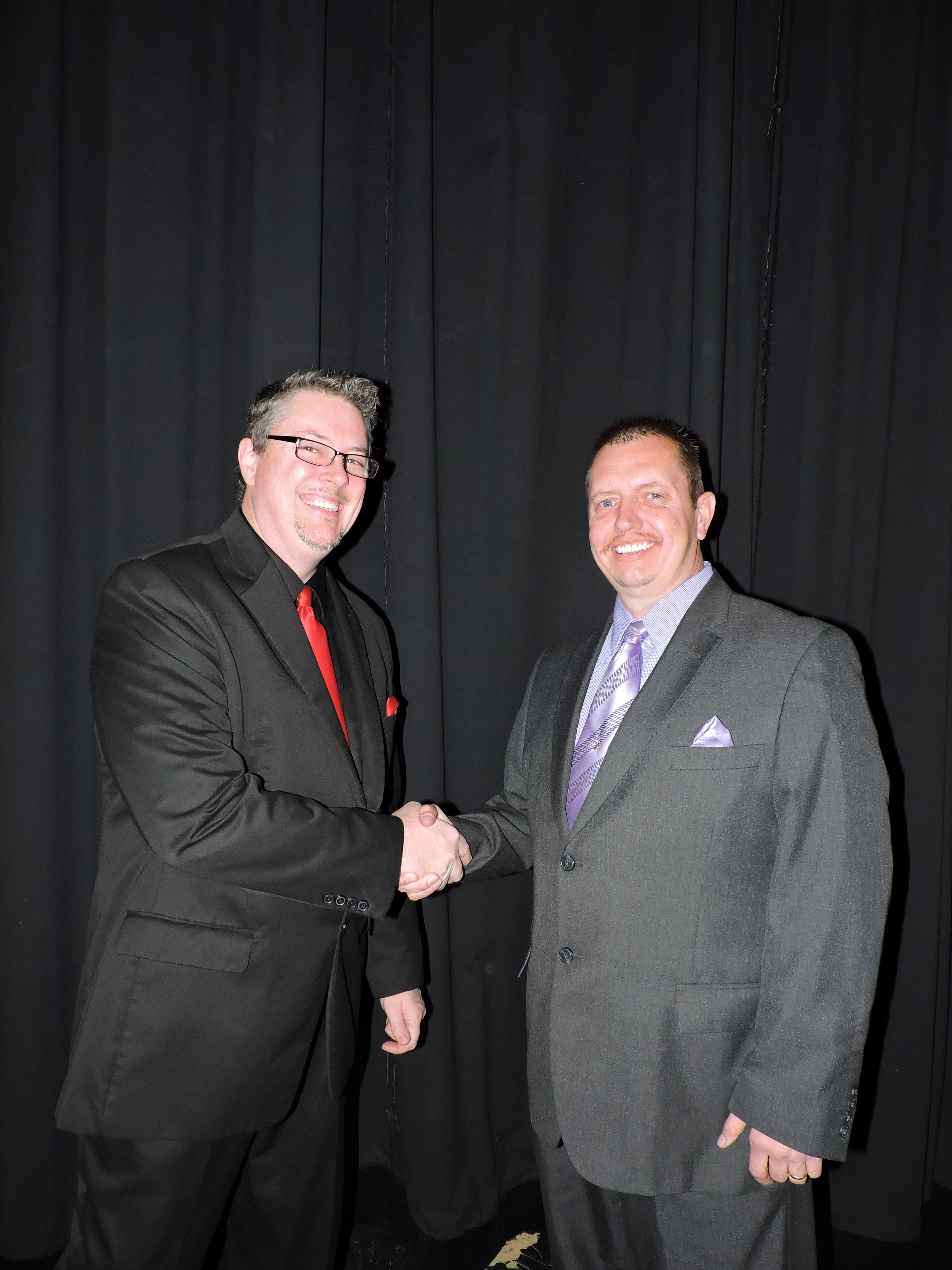 Appointed Quartet lead singer David Hill, left, partners with soloist Bobby Lewis, of Birchwood, at The Colonnade during the annual New Year's Eve Gospel Music Jubilee.