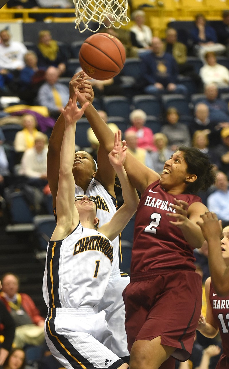 UTC's Alicia Payne (1) and Moses Johnson, and  Harvard's Shilpa Tummala reach for the rebound Monday, January 4, 2016, at McKenzie Arena in Chattanooga, Tenn.