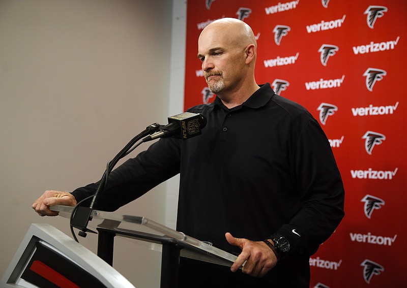 Atlanta Falcons NFL football head coach Dan Quinn speaks during a news conference at team headquarters  Monday, Jan. 4, 2016, in Flowery Branch, Ga. The Falcons finished the season 8-8 after a 20-17 loss to New Orleans on Sunday. (AP Photo/John Bazemore)