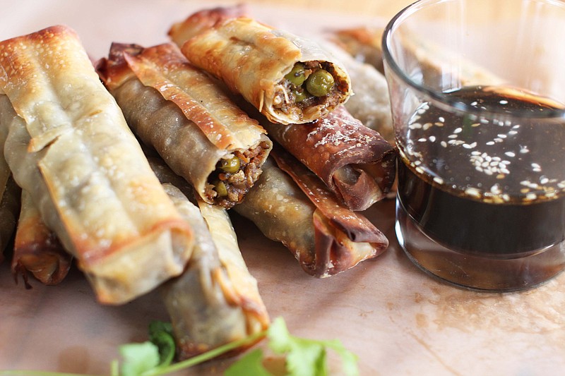 Baked egg rolls with sesame-soy dipping sauce.