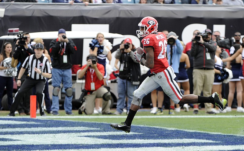 Georgia receiver Malcolm Mitchell scored a touchdown in his Bulldogs finale, Saturday's 24-17 win over Penn State in the TaxSlayer Bowl, but he has since turned his attention to the Senior Bowl and the NFL draft.