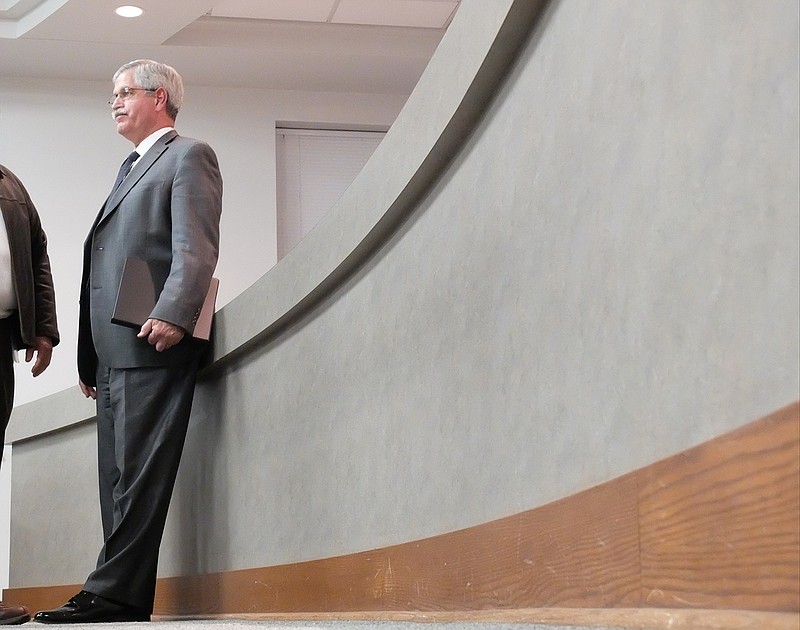 Superintendent of Schools Rick Smith stands and talks inside the Hamilton County School Board meeting room.