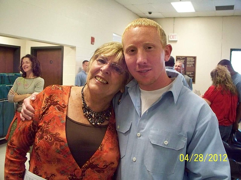 Adam Clyde Braseel puts an arm around his mother, Imojean Braseel-Davis, in this recent photo.