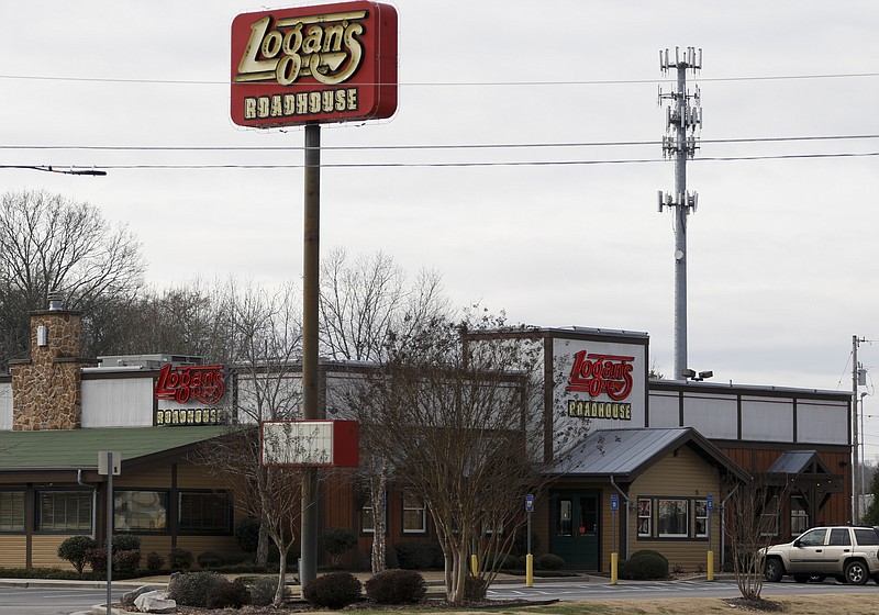 Customers dine at the Fort Oglethorpe, Georgia, Logan's Roadhouse where a former waitress worked before joining a class action lawsuit against the steakhouse for only being paid $2.13 an hour to roll silverware an restock.