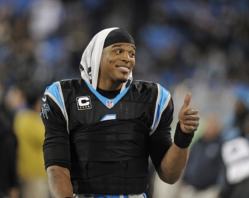 
              FILE - In this Jan. 3, 2016, file photo, Carolina Panthers quarterback Cam Newton (1) celebrates on the sidelines late in the second half of an NFL football game against the Tampa Bay Buccaneers, in Charlotte, N.C. Nearly every coach and every player heading to the playoffs will insist how beneficial skipping wild-card weekend is. It’s all about the bye in January. (AP Photo/Mike McCarn, File)
            
