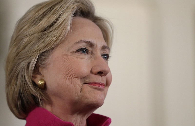 Democratic presidential candidate Hillary Clinton flashes a wan smile on the campaign trail, but allegations about her use of a private email server while secretary of state keep unfolding.
