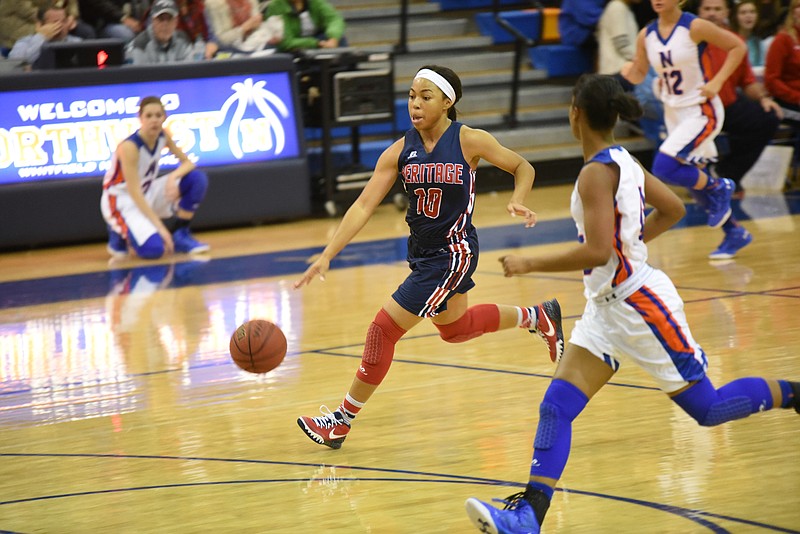 Heritage's Shayla Ludy (10) breaks for the basket Friday night at Northwest Whitfield.