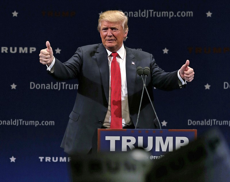 Republican presidential candidate Donald Trump flashes thumbs up after an address to a group of supporters at a campaign stop at the Flynn Center of the Performing Arts in Burlington, Vt., last Thursday.