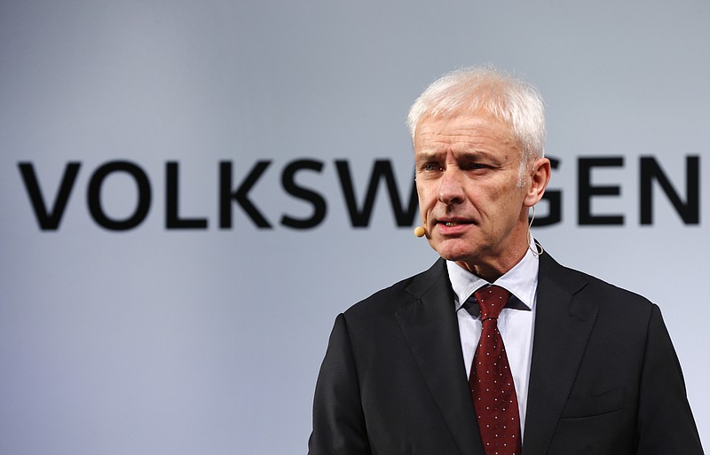 
              Volkswagen AG chief executive officer Matthias Müller speaks in Detroit, Sunday, Jan. 10, 2016. In his first US visit since American regulators said VW cheated pollution tests, Mueller apologized over a scandal that plunged the German auto giant into the deepest crisis of its history and could cost billions in fines, recalls and class-action lawsuits. (AP Photo/Paul Sancya)
            