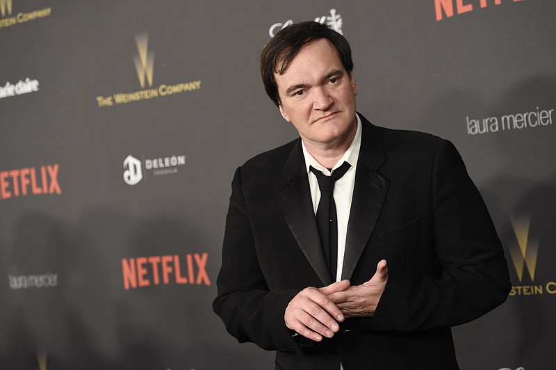 
              Quentin Tarantino arrives at The Weinstein Company and Netflix Golden Globes afterparty on Sunday, Jan. 10, 2016, at the Beverly Hilton Hotel in Beverly Hills, Calif. (Photo by Chris Pizzello/Invision/AP)
            