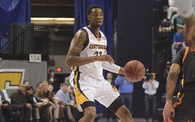 UTC's Tre' McLean looks to pass as the University of Tennessee at Chattanooga hosts Mercer in a men's basketball game on Tuesday, Jan. 5, 2016, in Chattanooga, Tenn. 