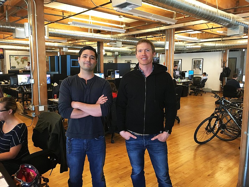 BuildZoom was founded by Jiyan Wei, left, and David Petersen, who grew up as friends in Bethesda, Md. They're pictured in BuildZoom's San Francisco headquarters.