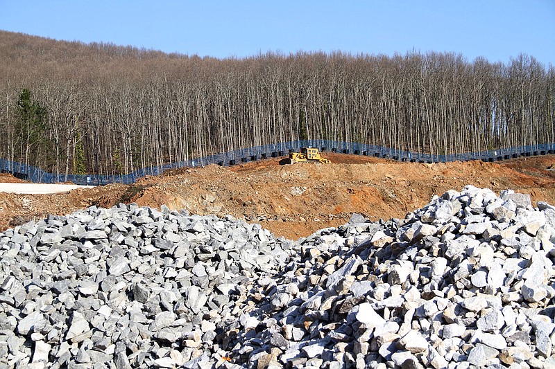 
              FILE - In this Sunday, Feb. 15, 2015 file photo a bulldozer works at the site of a gold mine in Skouries village, northern Greece. Canadian mining company Eldorado Gold said on Tuesday, Jan. 12, 2016 it is suspending work at the site and laying off 600 workers following protests by local residents and a spat with the country's left wing government. (Grigoris Siamidis/InTime News via AP, File) GREECE OUT
            