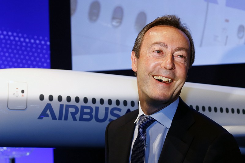 
              Airbus SA CEO Fabrice Bregier shares a laugh with photographers at the end of the annual press conference in Paris, Tuesday, Jan. 12, 2016. Airbus won hundreds more plane orders last year than rival Boeing, but the American planemaker handed over more aircraft to customers. Airbus SA said Tuesday that it exceeded its targets in 2015, taking in 1,036 net orders and delivering 635 jets to airlines and other buyers. (AP Photo/Francois Mori)
            