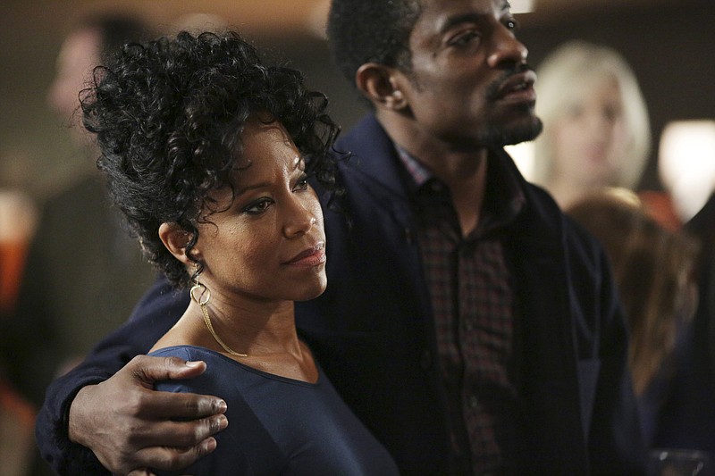 
              In this image released by ABC, Regina King, left, and Andre Benjamin appear in a scene from "American Crime," airing Wednesdays at 10 p.m. ET on ABC. (Ryan Green/ABC via AP)
            