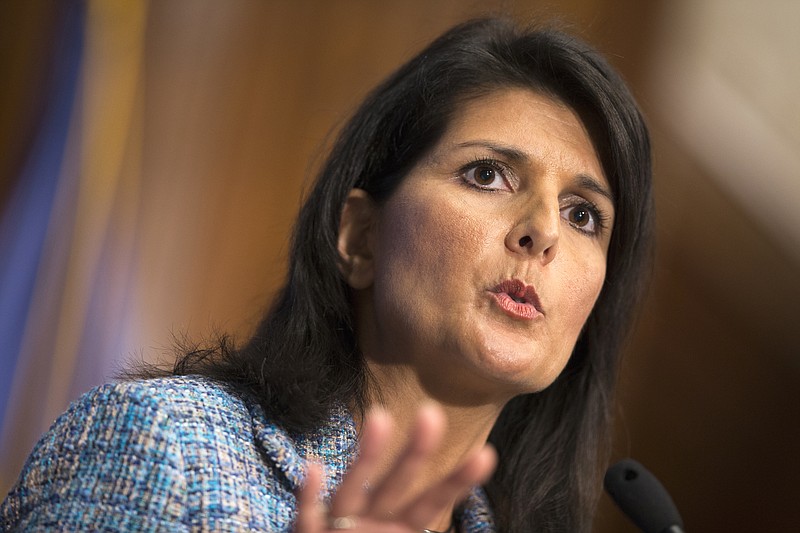 
              FILE - In this Sept. 2, 2015, photo. South Carolina Gov. Nikki Haley speaks at the National Press Club in Washington. Americans should resist "the siren call of the angriest voices" in how it treats immigrants, Haley said Jan. 12, 2016, as the GOP used its formal response to President Barack Obama's State of the Union address to try softening the tough stance embraced by some of the GOP's leading presidential candidates. (AP Photo/Evan Vucci)
            