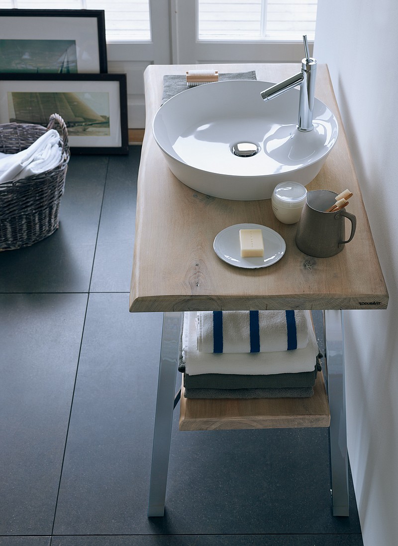 Philippe Starck's Cape Cod vanity for Duravit evokes an easy-yet-elegant New England coastal vibe, with weathered wood vanities and slim-edge sinks in several shapes.