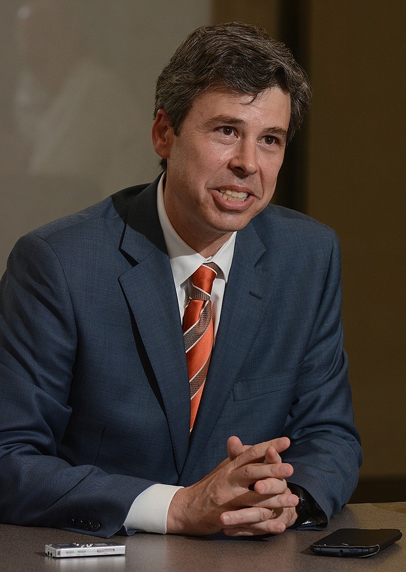 Chattanooga Mayor Andy Berke speaks to members of the Chattanooga Times Free Press editorial board Wednesday, May 20,  2015, in Chattanooga, Tenn. 