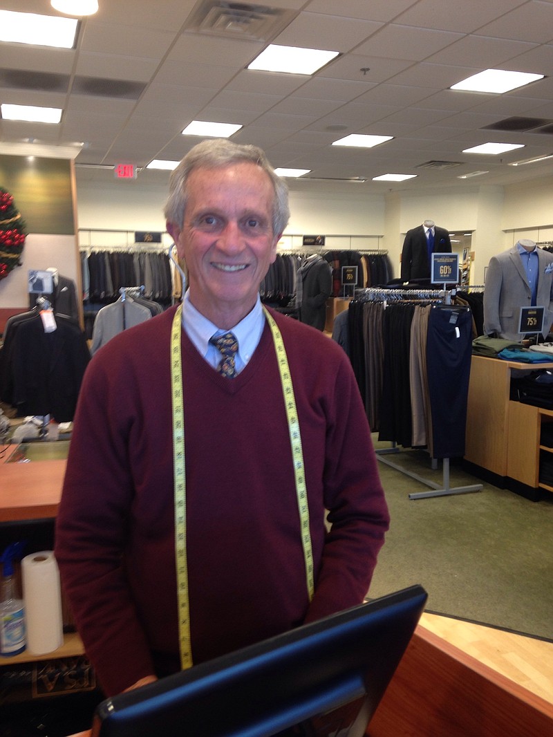 Dennis Munczenski, the manager at Jos. A. Bank store on Highway 153